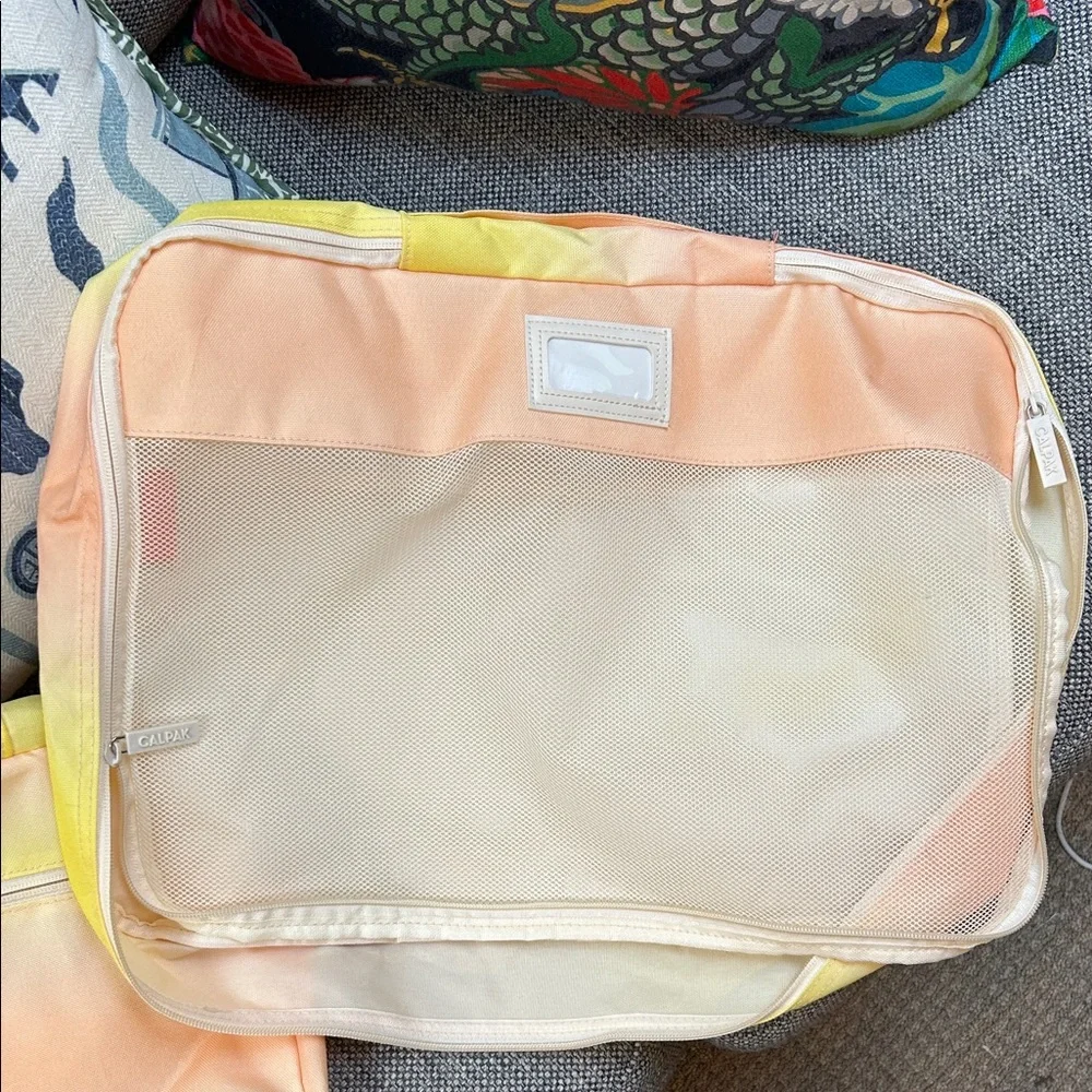 Calpak Yellow and Cream Garment Bags